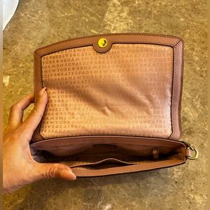 Small shoulder bag, Blush pink with a chain strap.